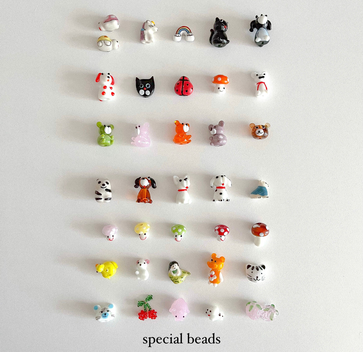 Assorted glass special beads to choose from when creating a Buttercup Studio Custom Regular Pearls Necklace.