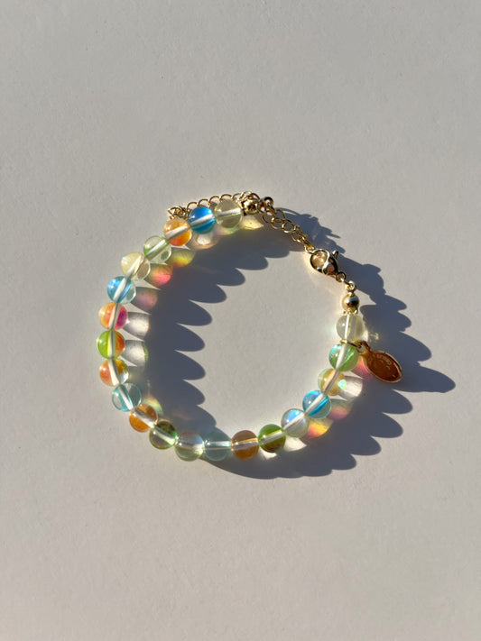 A studio shot of Buttercup Studio's Tropical Bubbly Bubbles Bracelet. Made with assorted colourful glass beads.