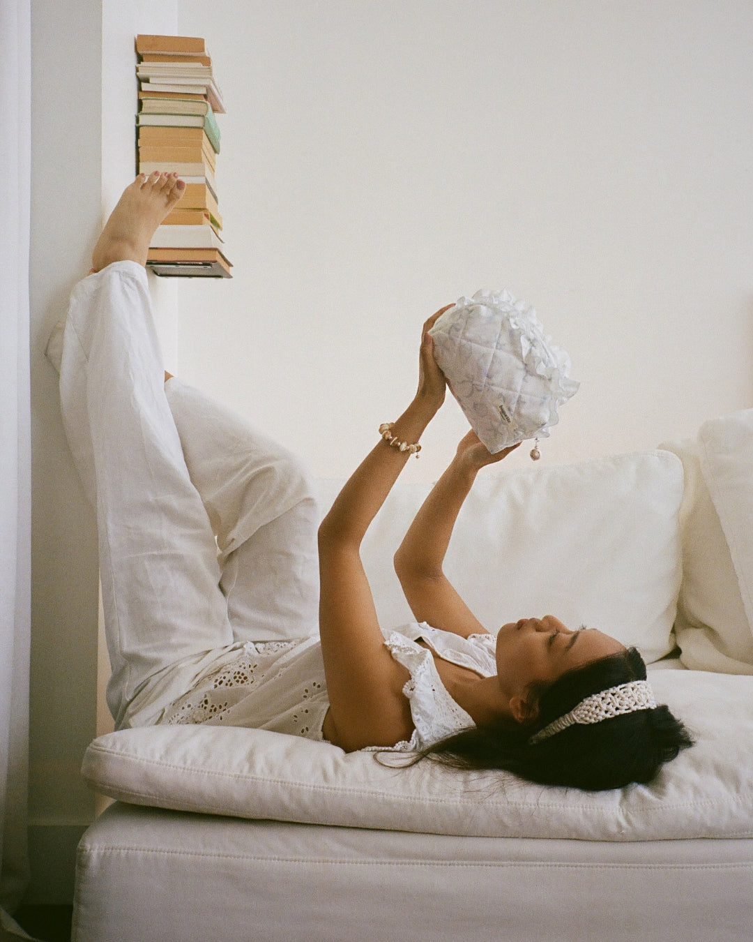 The Baguette x Buttercup Studio collaboration brings together the Limited Edition Ocean Spiral Ruffles Pouch and the Exclusive Sundial Oyster Freshwater Pearl Bracelet. This pairing combines Baguette’s signature ruffled silhouette in a custom print with Buttercup Studio’s refined freshwater pearl jewellery.&nbsp;