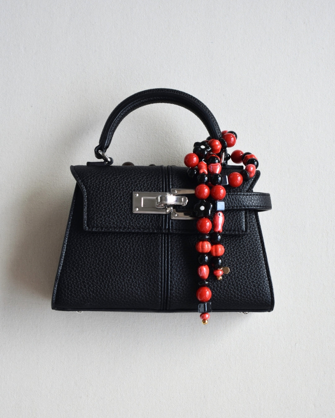 The Poppy Noir Bag Charm - Limited