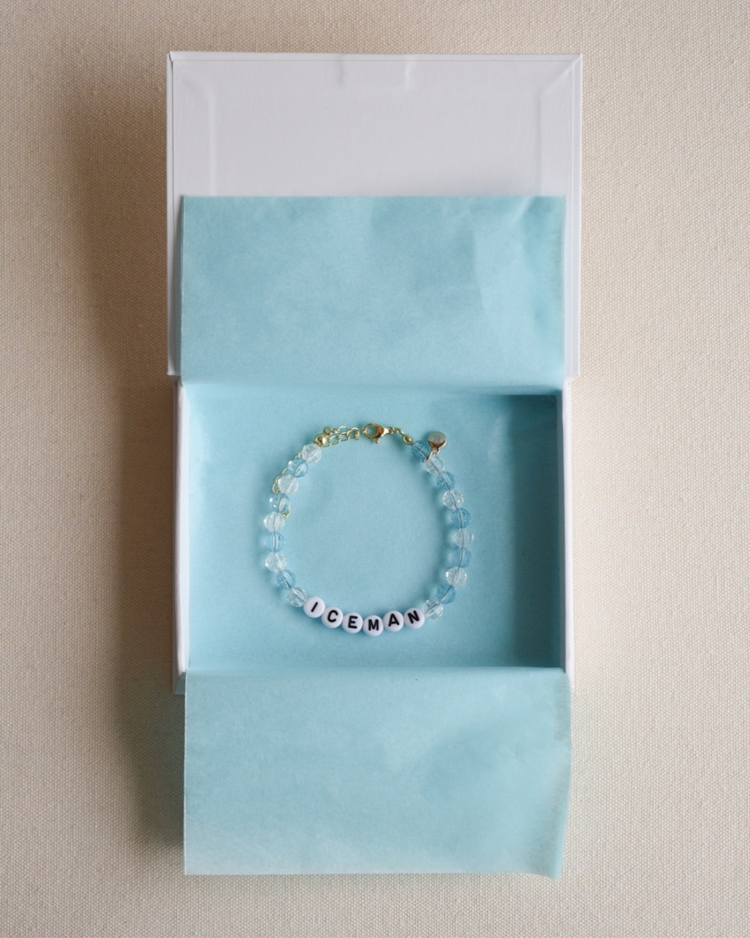 Drake Custom Beaded Bracelet with 'ICEMAN' a light blue background