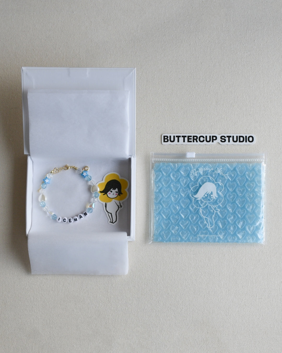 Drake Iceman Beaded Bracelet with 'Buttercup Studio' Branding.